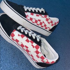 Black, red, white size 7 vans. Only worn a couple of times. It good condition.